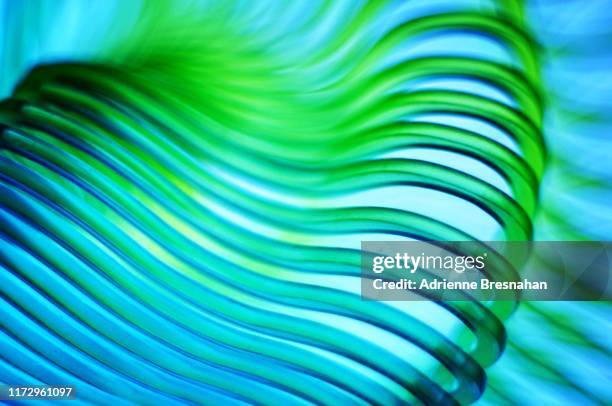 blue and green abstract wave pattern - shaking motion stock pictures, royalty-free photos & images