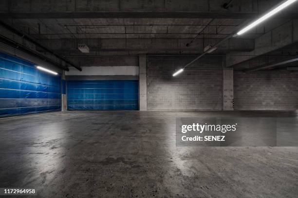 empty pit garage - racing garage stock pictures, royalty-free photos & images