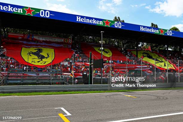 Ferrari fans hold banners in the stands during qualifying for the F1 Grand Prix of Italy at Autodromo di Monza on September 07, 2019 in Monza, Italy.