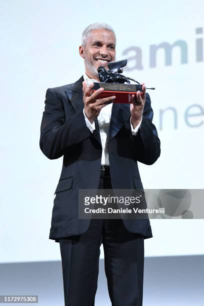 Sami Bouajila receives the Orizzonti Award for Best Actor for "Bik Eneich – Un Fils" during the Award Ceremony during the 76th Venice Film Festival...