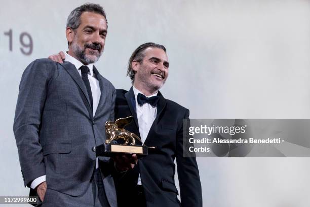 Todd Phillips and Joaquin Phoenix receive the Golden Lion for Best Film Award for "Joker" during the Award Ceremony of the 76th Venice Film Festival...