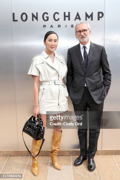 Chriselle Lim and Jean Cassegrain attends the Longchamp SS20 Runway Show at Hearst Plaza, Lincoln Center on September 07, 2019 in New York City.