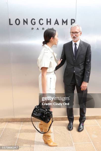 Chriselle Lim and Jean Cassegrain attends the Longchamp SS20 Runway Show at Hearst Plaza, Lincoln Center on September 07, 2019 in New York City.