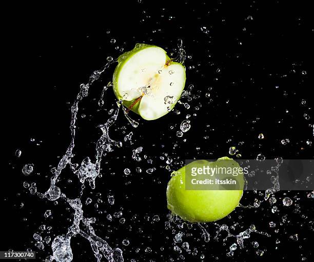 apples - apple water splashing stock pictures, royalty-free photos & images