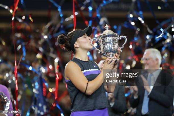 Bianca Andreescu of Canada poses with the championship trophy after winning the Women's Singles final match against Serena Williams of the United...