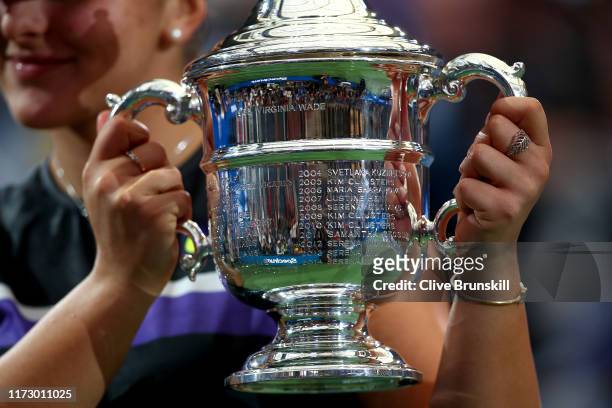 Detailed view is seen as Bianca Andreescu of Canada celebrates with the championship trophy during the trophy presentation ceremony after winning the...
