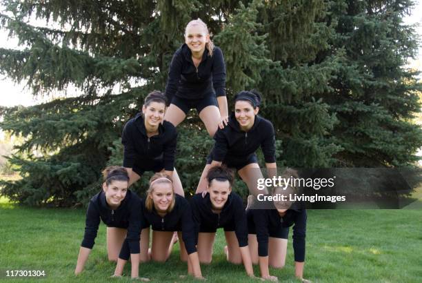 teenage girls - college cheerleaders stock pictures, royalty-free photos & images