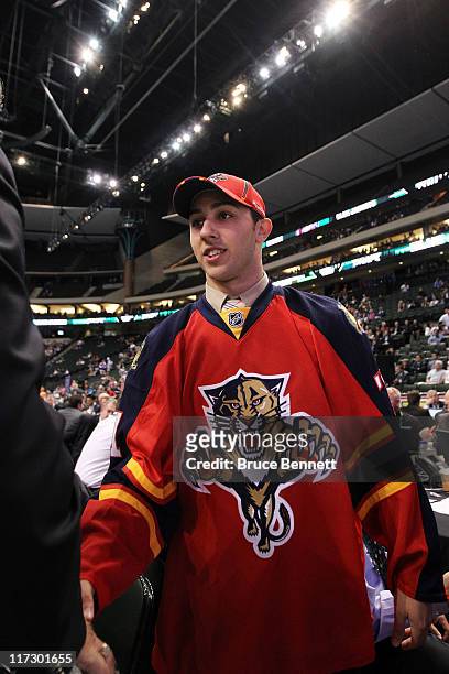 64th overall pick Vincent Trocheck by the Florida Panthers looks on from the draft floor during day two of the 2011 NHL Entry Draft at Xcel Energy...