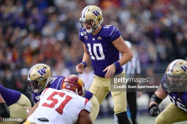 Washington Huskies quarterback Jacob Eason calls plays at the line of scrimmage during a PAC12 Conference game between the Washington Huskies and the...
