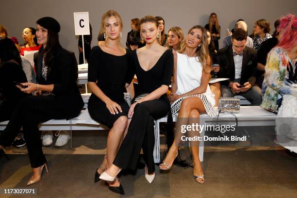 Michon Vanas, Alanna Whittaker and Marta Carriedo attend the Chiara Boni front row during New York Fashion Week: The Shows at Gallery II at Spring...