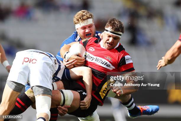 Luke Whitelock of Canterbury is tackled by Blake Gibson of Auckland during the Round 5 Mitre 10 Cup match between Auckland and Canterbury at Eden...