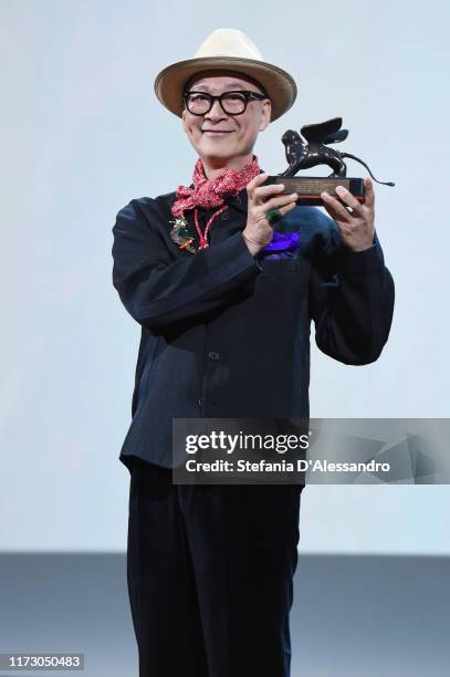 Yonfan receives the Award for Best Screenplay for "No.7 Cherry Lane" during the Award Ceremony during the 76th Venice Film Festival at Sala Grande on...