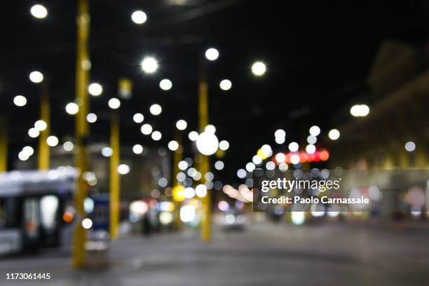 defocused street lights at night in graz, austria - graz austria stock pictures, royalty-free photos & images