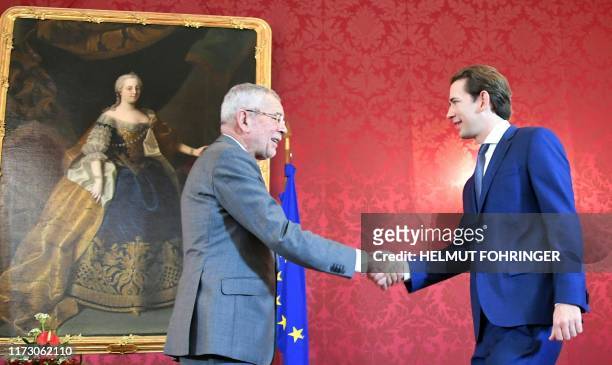 Austria's President Alexander Van der Bellen geets Former Chancellor and head of Austrian People's party Sebastian Kurz on October 2, 2019 at the...