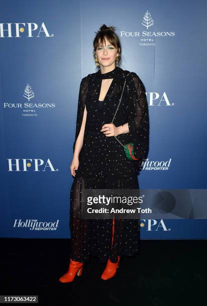 Ashleigh Cummings attends The Hollywood Foreign Press Association and The Hollywood Reporter party at the 2019 Toronto International Film Festival at...