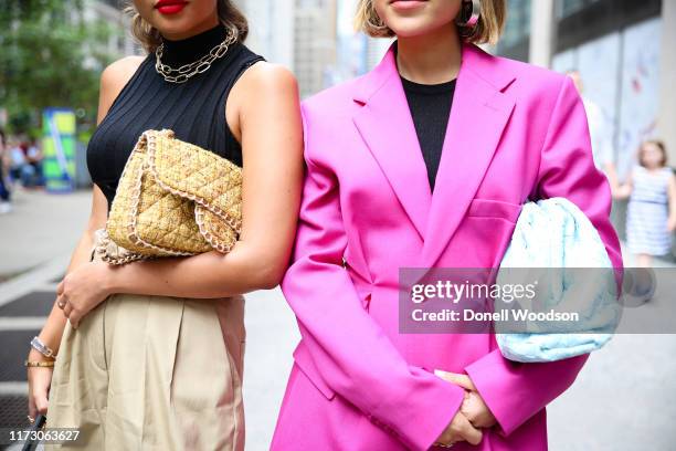 Two guests pose during New York Fashion Week at Gotham Hall on September 07, 2019 in New York City.