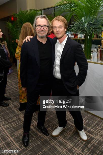 Gary Oldman and Alfie Allen attend The Hollywood Foreign Press Association and The Hollywood Reporter party at the 2019 Toronto International Film...
