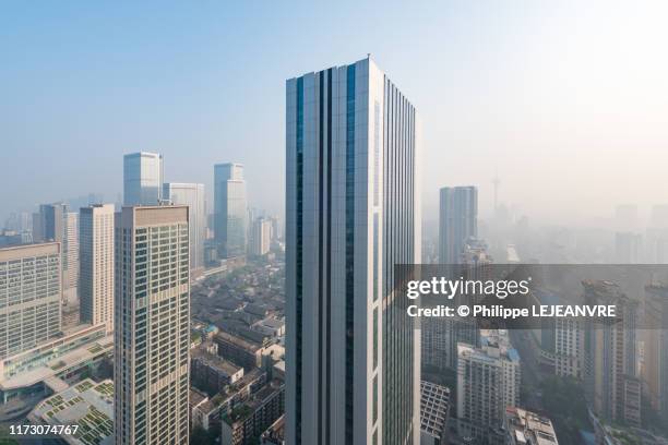 chengdu skyline in the haze - chengdu skyline stock pictures, royalty-free photos & images