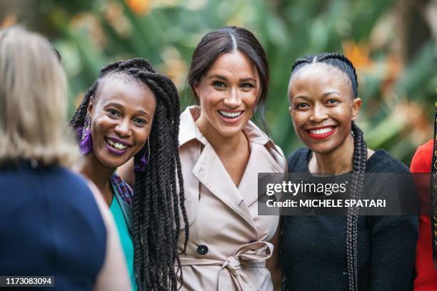 Meghan, the Duchess of Sussex arrives at the British High Commissioner residency in Johannesburg where they will meet with Graca Machel, widow of...