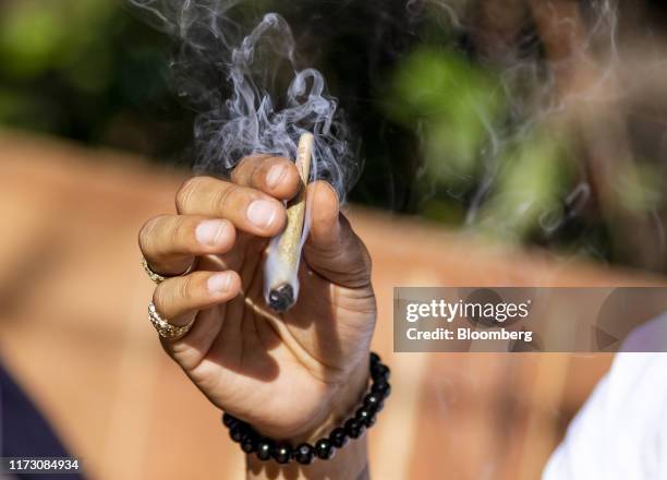 Customer smokes marijuana at the Lowell Cafe, a new cannabis lounge in West Hollywood, California, U.S., on Tuesday, Oct. 1, 2019. America's first...