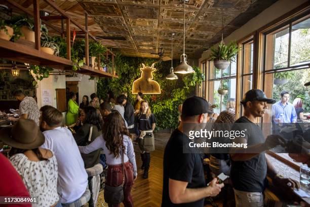 Customers smoke marijuana at the Lowell Cafe, a new cannabis lounge, in West Hollywood, California, U.S., on Tuesday, Oct. 1, 2019. America's first...