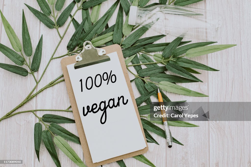 Clipboard  with 100% vegan text.Top view