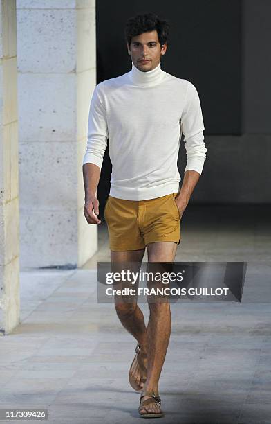 Model presents a creation by french designer Veronique Nichanian for the Hermes label during the brand men's spring-summer 2012 fashion collection...