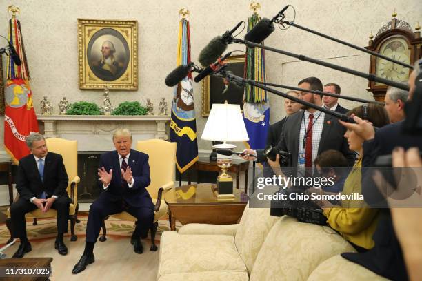 President Donald Trump meets with Finnish President Sauli Niinisto in the Oval Office of the White House on October 02, 2019 in Washington, DC. The...