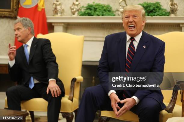 President Donald Trump meets with Finnish President Sauli Niinisto in the Oval Office of the White House on October 02, 2019 in Washington, DC. The...