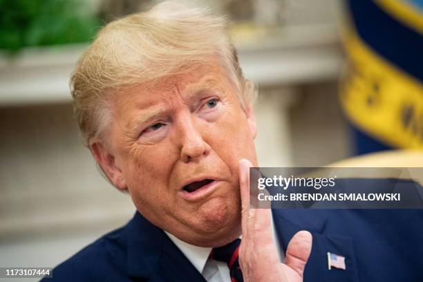 President Donald Trump speaks to the press during a meeting with President of Finland Sauli Niinisto at the White House October 2 in Washington, DC.