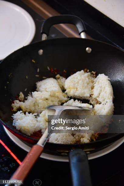 Someone Making Fried Rice Making Fried Rice Photos and Premium High Res Pictures - Getty Images