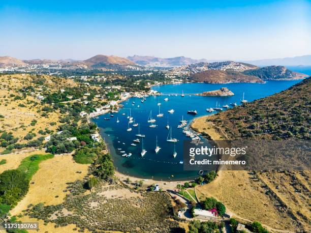 aerial view of gumusluk bay in bodrum, turkey - bodrum stock pictures, royalty-free photos & images