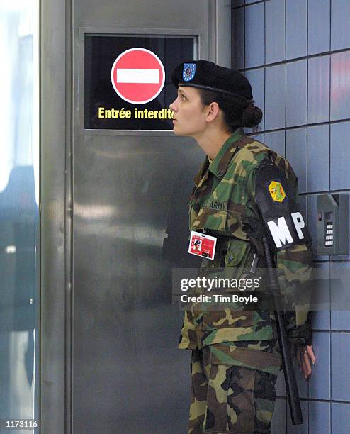 Kristin Raab, from Pearly City, IL. With the 333 Military Police Unit from Freeport, IL., stands guard at her checkpoint October 4, 2001 in the...