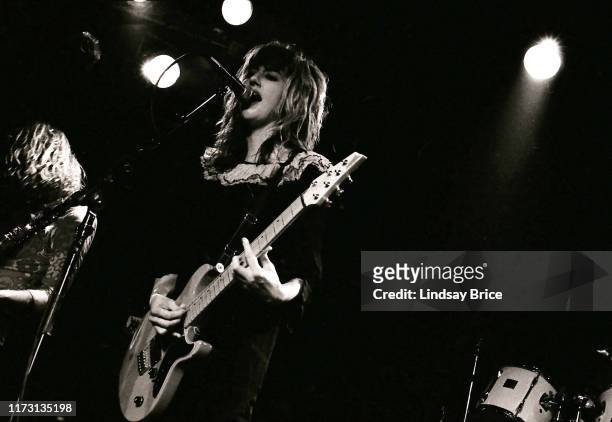 Vocalist and guitarist Kim Shattuck performs in The Muffs at the Whisky on the Sunset Strip on October 27, 1992 in West Hollywood, California.
