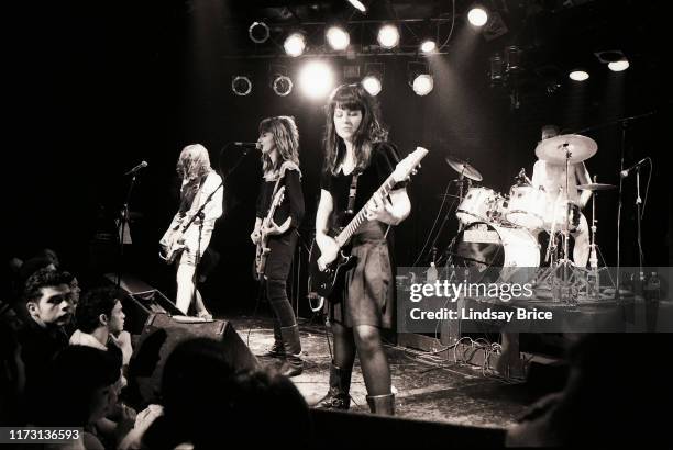 Kim Shattuck, Melanie Vammen, and Criss Crass perform in The Muffs at the Whisky on the Sunset Strip on October 27, 1992 in Los Angeles. (Photo by...