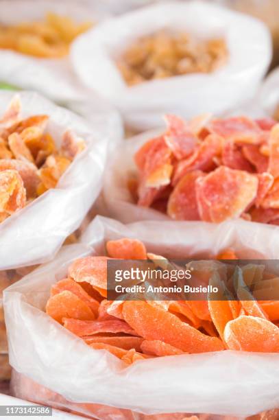 dried fruit in bags at the fruit market in panarea - aeolian islands stockfoto's en -beelden