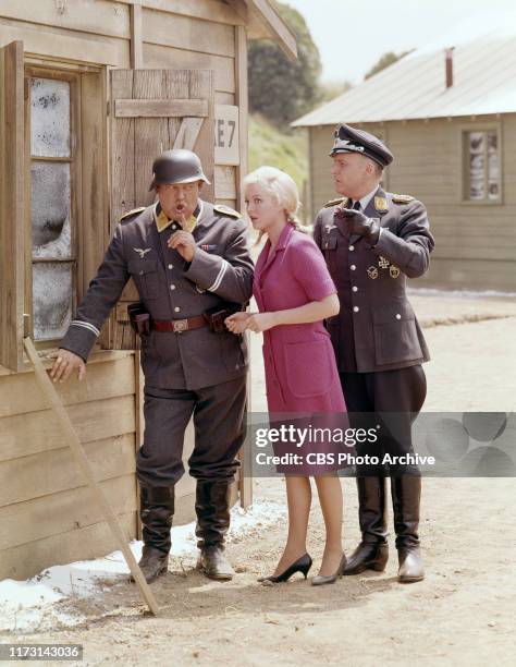 John Banner , Cynthia Lynn and Werner Klemperer star in Hogan's Heroes, a CBS television WWII prisoner of war camp situation comedy. Initial...