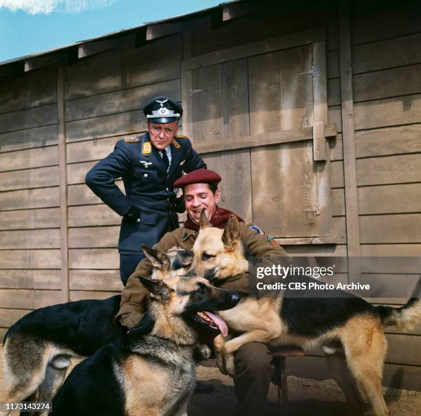 Werner Klemperer and Robert Clary star in Hogan's Heroes, a CBS television WWII prisoner of war camp situation comedy. Initial broadcast September...