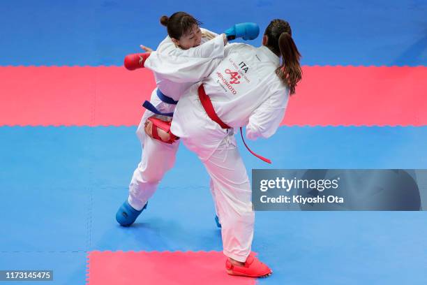 Ayumi Uekusa of Japan and Clio Ferracuti of Italy compete in the Women’s Kumite +68kg final on day three of the Karate 1 Premier League at Nippon...