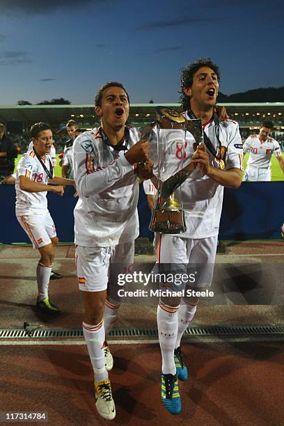 Thiago Alcantara and Daniel Parejo celebrate with the winners trophy after their 2-0 victory during the UEFA European Under-21 Championship Final...