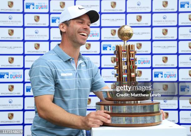 Paul Casey of England celebrates with the trophy following Day 4 of the Porsche European Open at Green Eagle Golf Course on September 08, 2019 in...