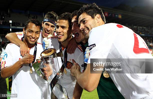 Spain team lifts the winners trophy after their 2-0 victory during their UEFA European U21 Championship Final match between Switzerland and Spain at...