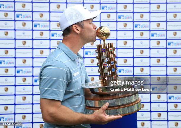 Paul Casey of England celebrates with the trophy following Day 4 of the Porsche European Open at Green Eagle Golf Course on September 08, 2019 in...