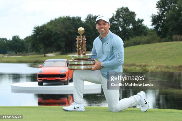 Paul Casey of England celebrates with the trophy following Day 4 of the Porsche European Open at Green Eagle Golf Course on September 08, 2019 in...