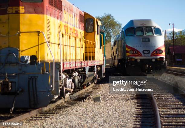 santa fe, nm: two trains in santa fe railyard - railroad caboose stock pictures, royalty-free photos & images
