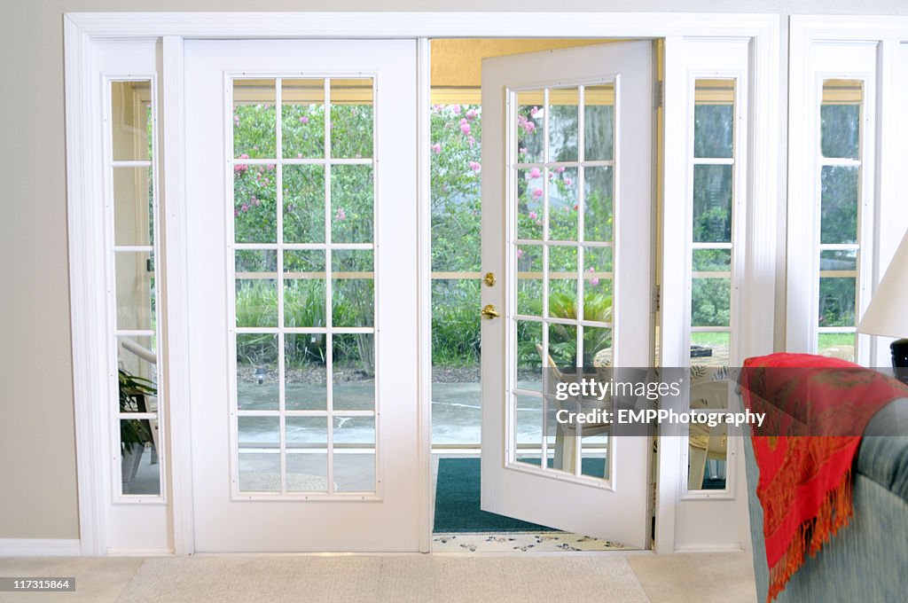 Open White French Doors Without Curtains