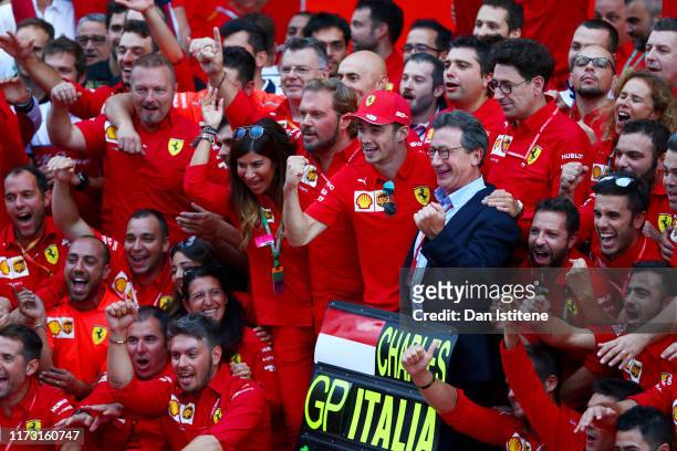 Race winner Charles Leclerc of Monaco and Ferrari celebrates with Ferrari CEO Louis C. Camilleri and his team after the F1 Grand Prix of Italy at...