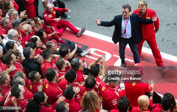 Ferrari CEO Louis C. Camilleri celebrates with the Ferrari team after the F1 Grand Prix of Italy at Autodromo di Monza on September 08, 2019 in...