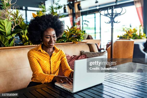 all the connections right when she needs - dark skin tone stock pictures, royalty-free photos & images