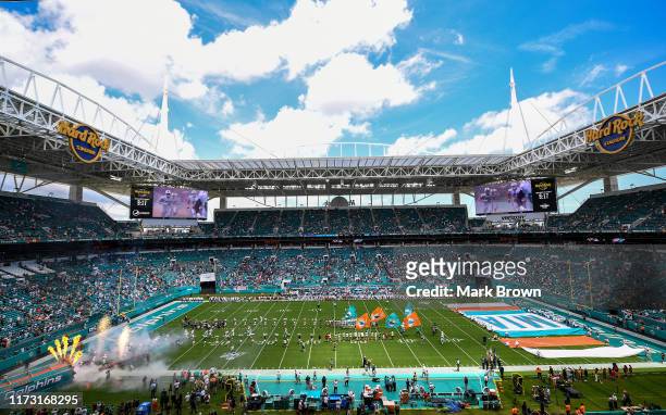 The Miami Dolphins are introduced prior to the game against the Baltimore Ravens at Hard Rock Stadium on September 08, 2019 in Miami, Florida.